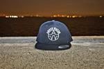 The Above Water Black Snapback Hat w/White Logo